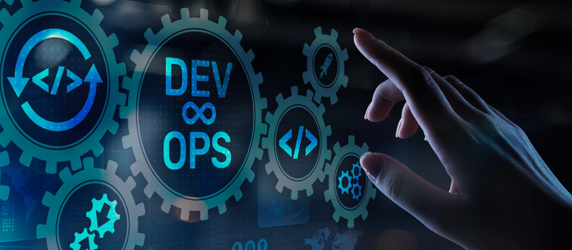 Symbolbild mit Zahnrädern und Hand zur Darstellung Devops